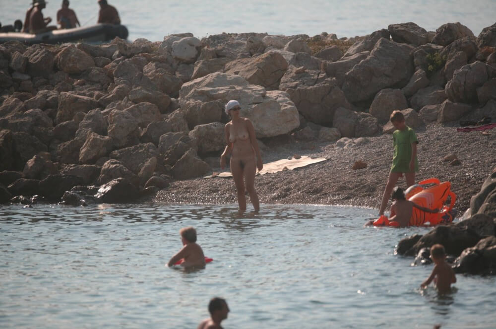 FKK cove pyramid in waters - These movements promote an open attitude toward nudity without sexual connotations