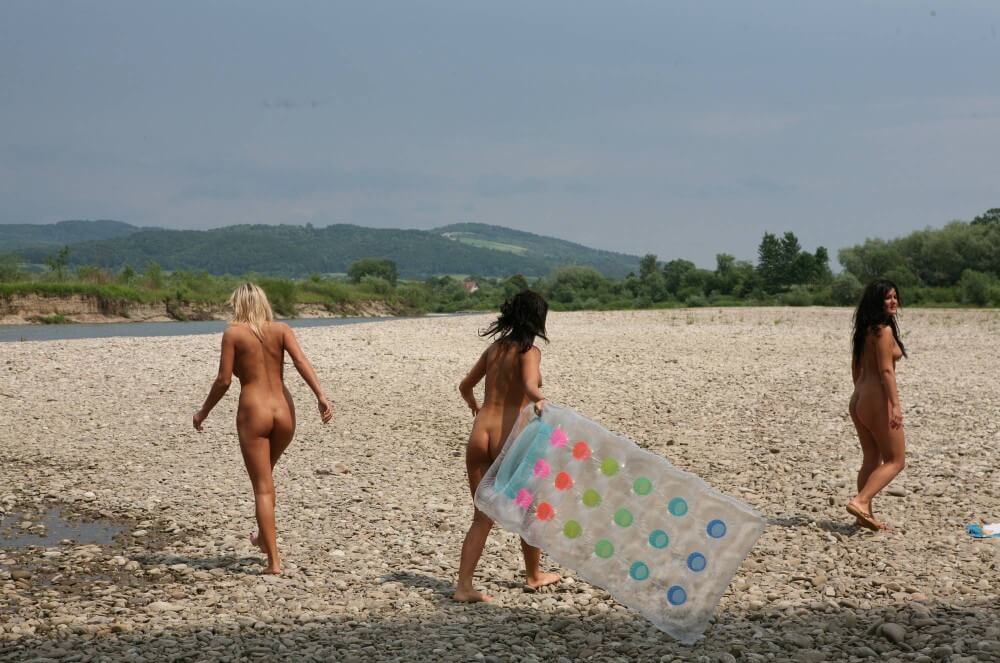 Naturist Park Floating On River photos - Blending in with the crowd of nudists