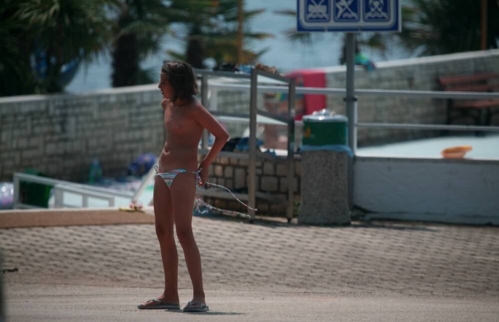 Naturist Pool Walkaround pics - Watching naked nudists