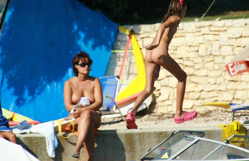 Bright Day Sun Tanning pics - Nudity in naturism is not usually an end in itself