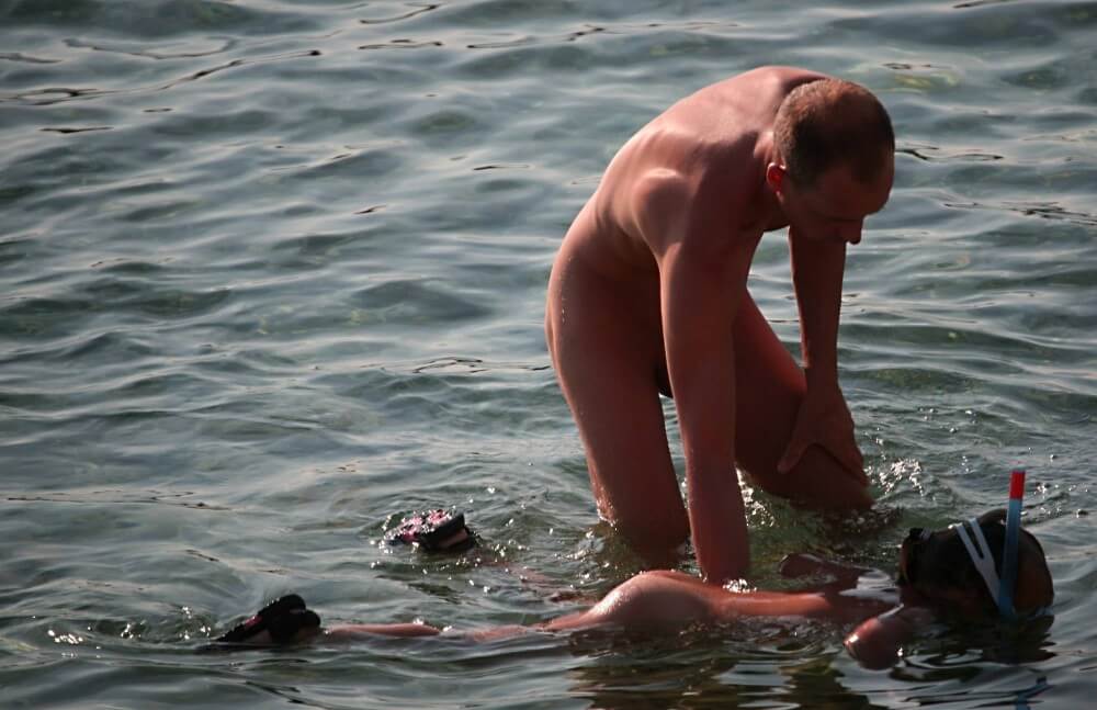 Father Floats His Daughter pics - Nudity in naturism is not usually an end in itself