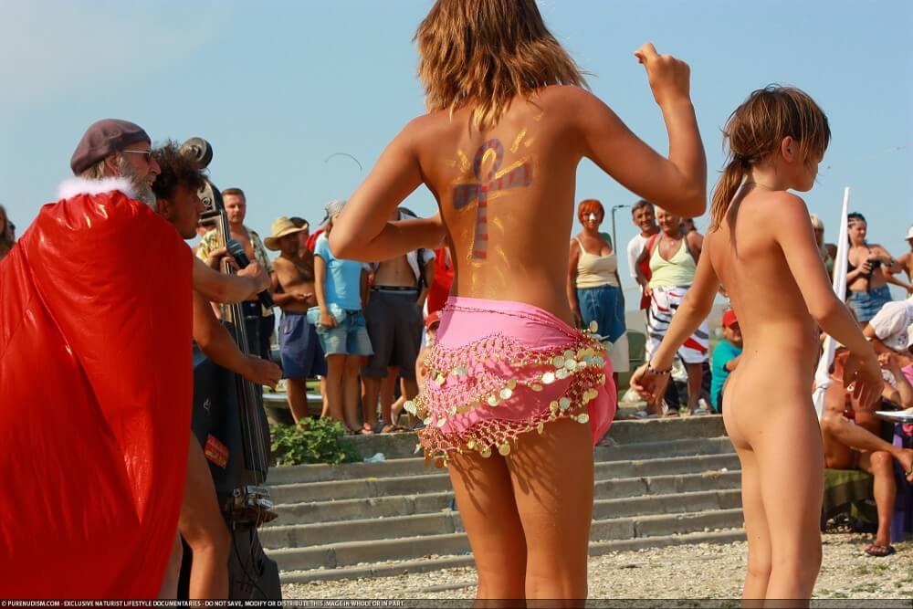 Colorful Carnival Dancing photos - In naturism, nature serves as the bodys natural clothing